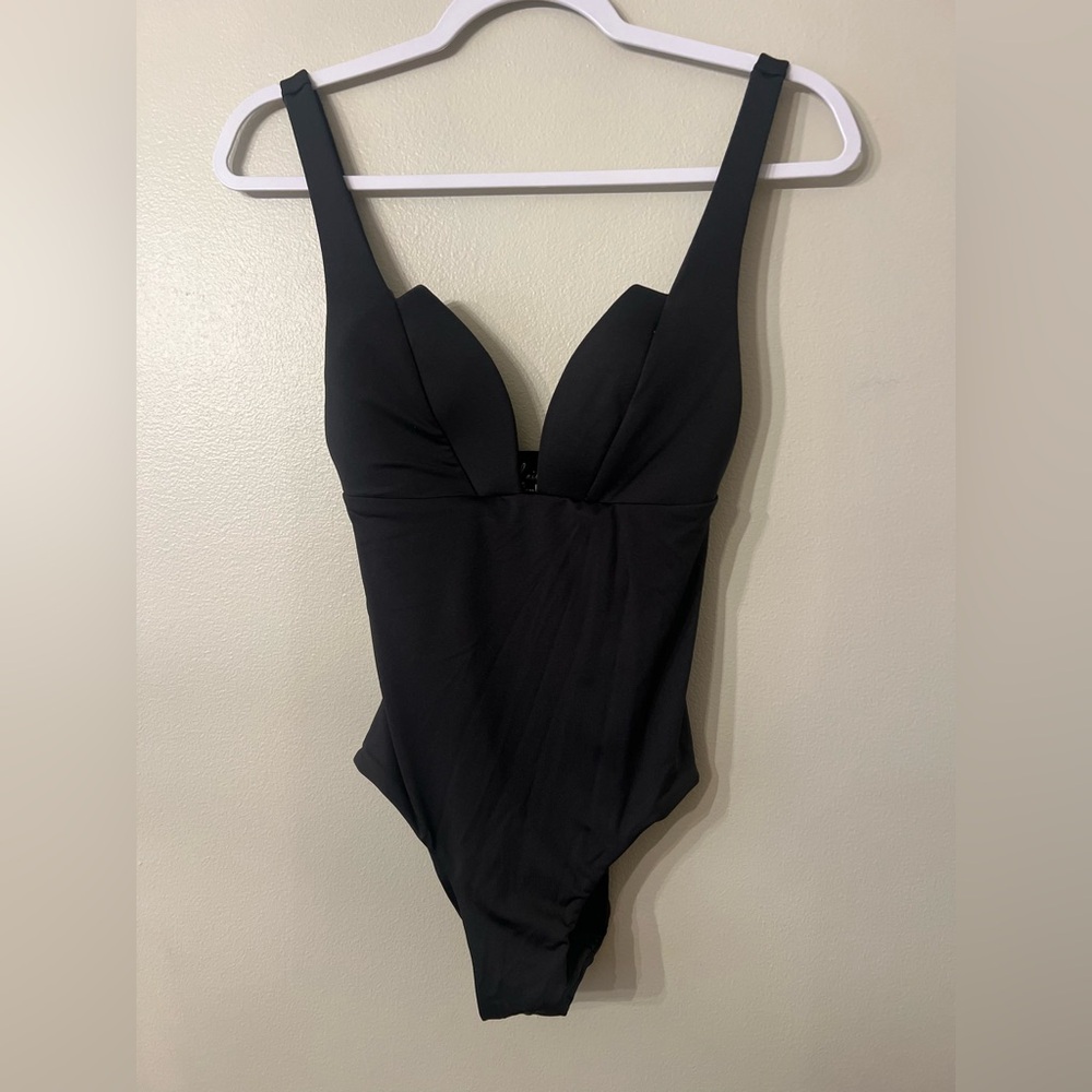 Thaikila Black One-Piece Swimsuit 
New with tags 
Size medium